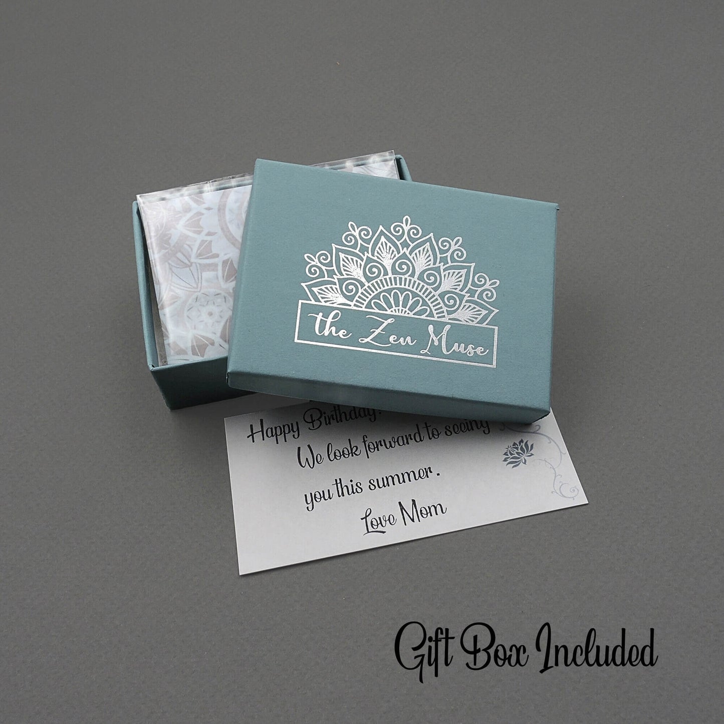 A small jewelry gift box is shown with an optional gift note for gift giving. A gift box is included with every order.