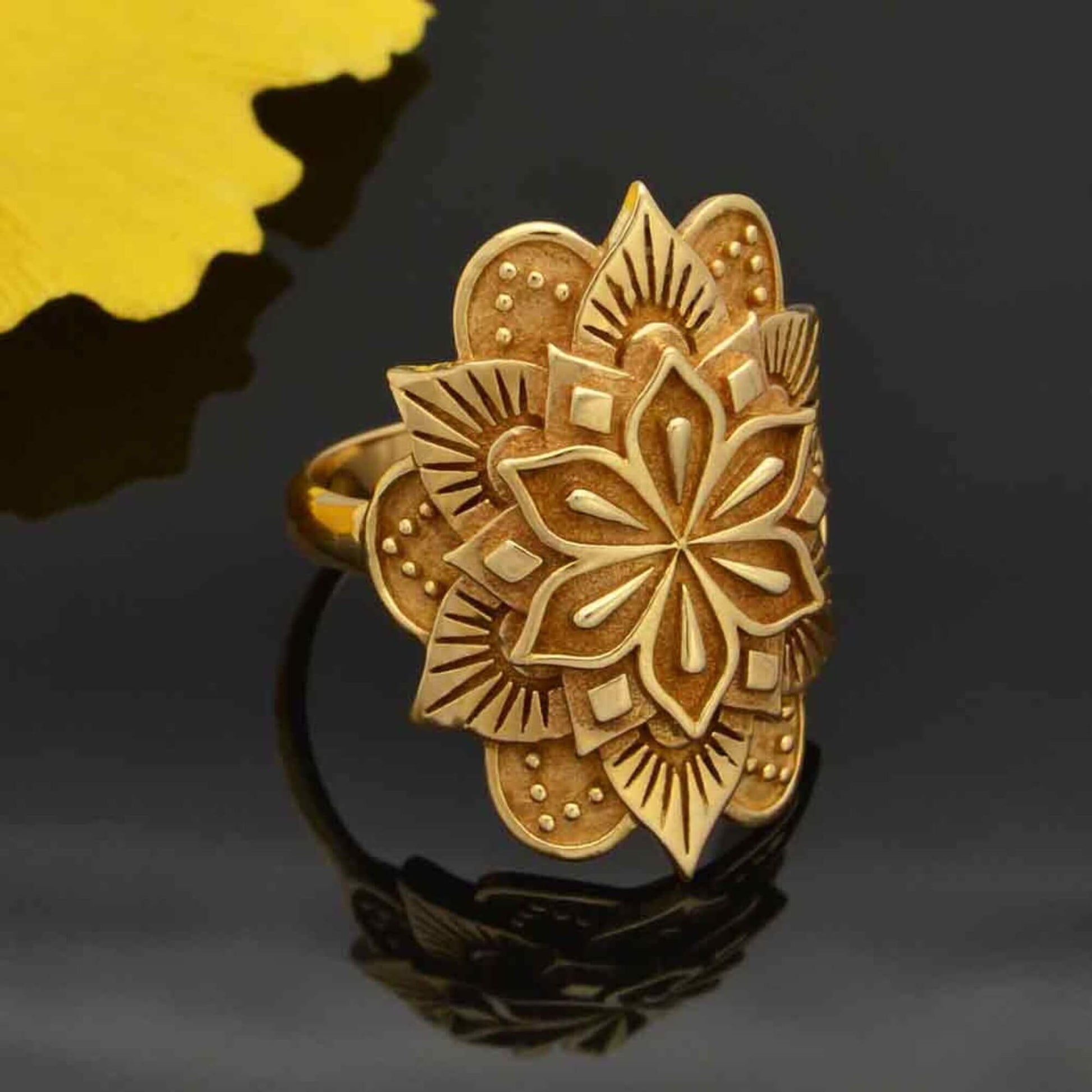 Gold mandala ring made from bronze. Large mandala statement ring for women with intricate floral petals.