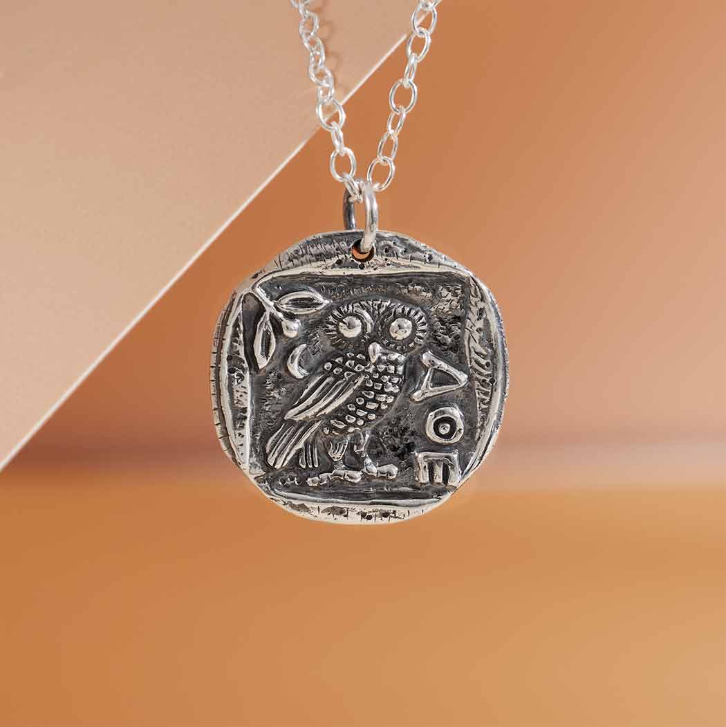 Sterling silver Athena owl coin pendant. 