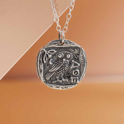 Sterling silver Athena owl coin pendant. 