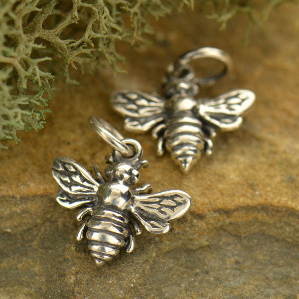 Sterling silver tiny bee charm earrings. 