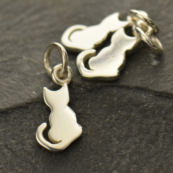 Sterling silver tiny cat charm earrings. 
