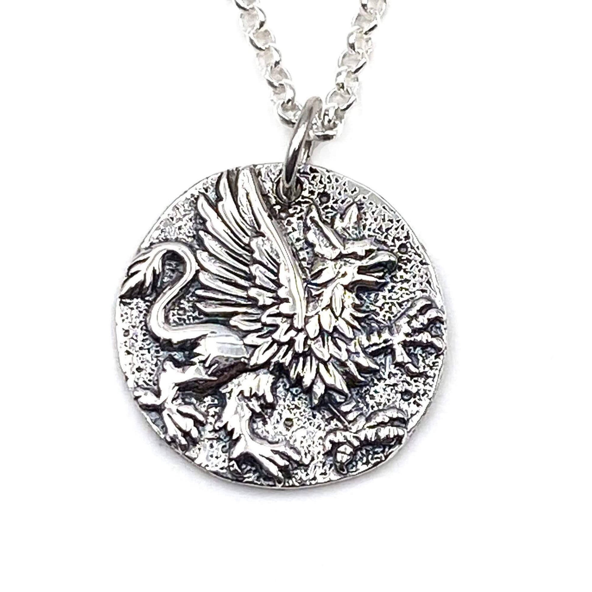 Detailed view of a Greek Mythology Griffin pendant with a eagles head, wings and a lions body. 