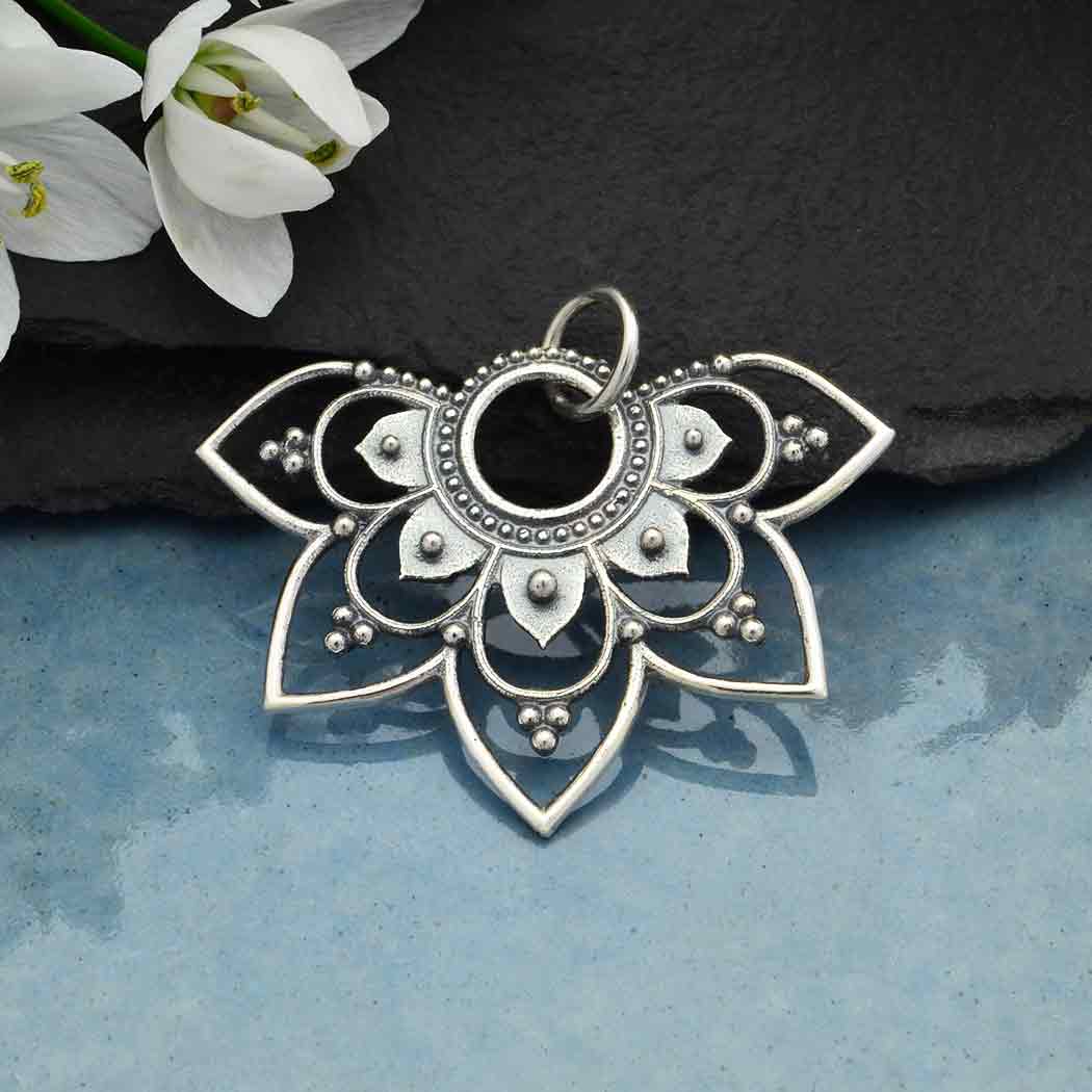 Sterling silver half mandala lotus charm. 
