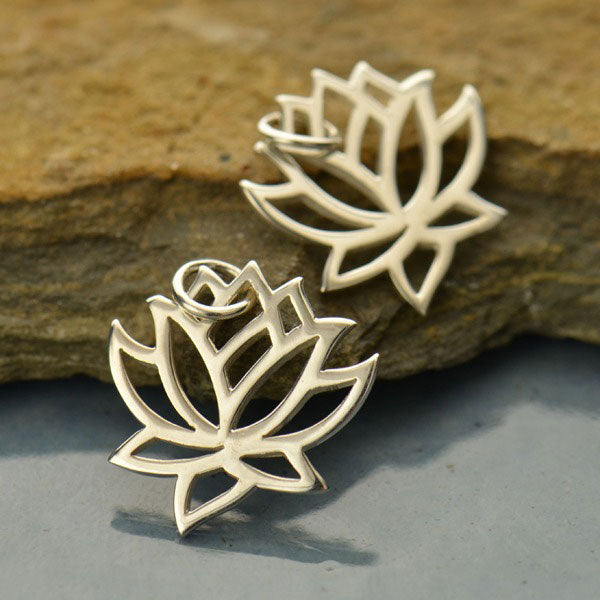 Sterling silver lotus charm earrings. 