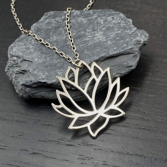 Large openwork flower silver lotus pendant on a sterling silver chain.