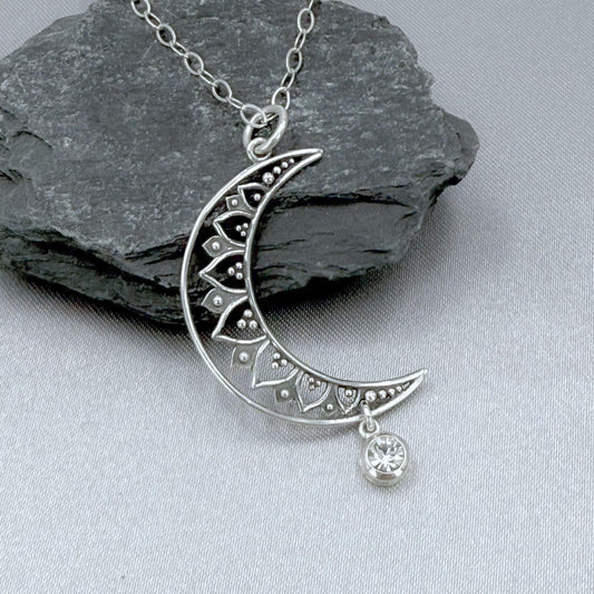 Celestial large moon and star pendant in sterling silver.