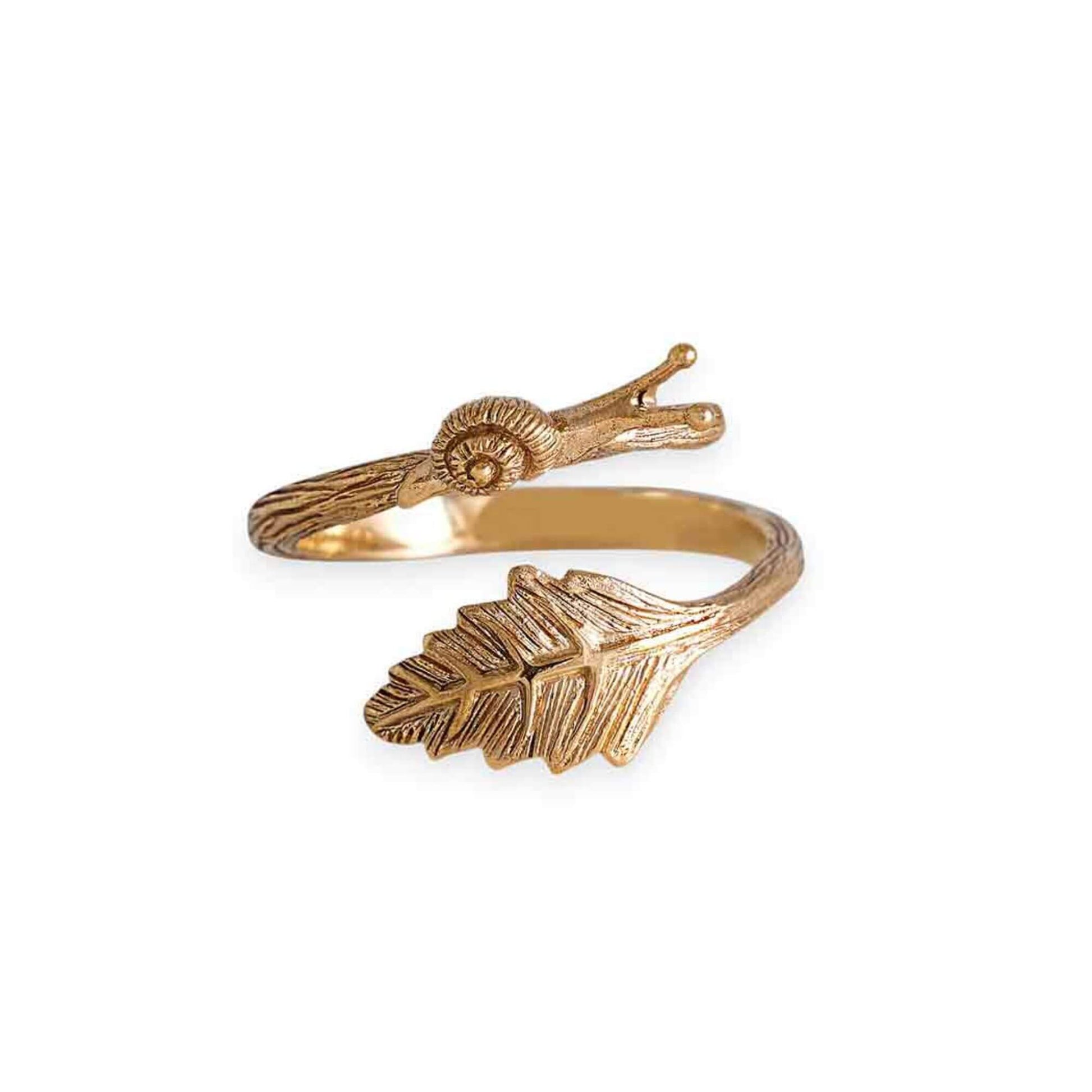 CLose up shiny gold with oxidized detail or bark, snail and leaf on a bronze ring for women. 