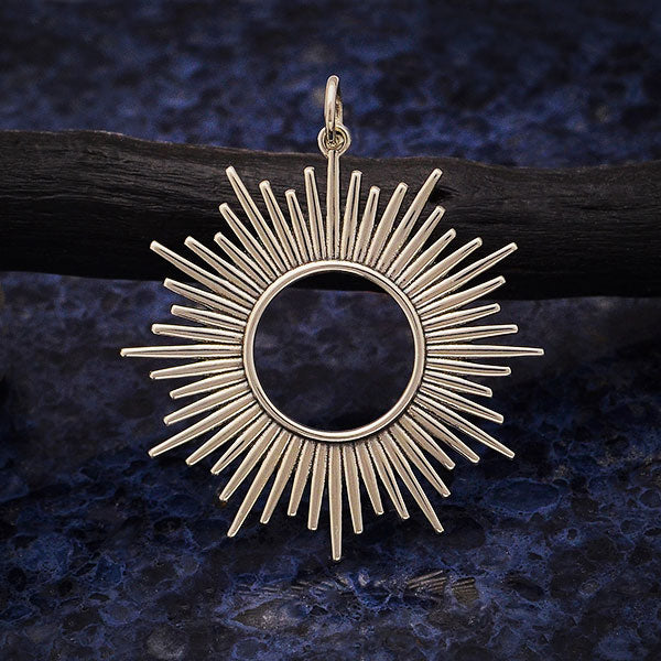 Sterling silver sun burst ray pendant charm. 
